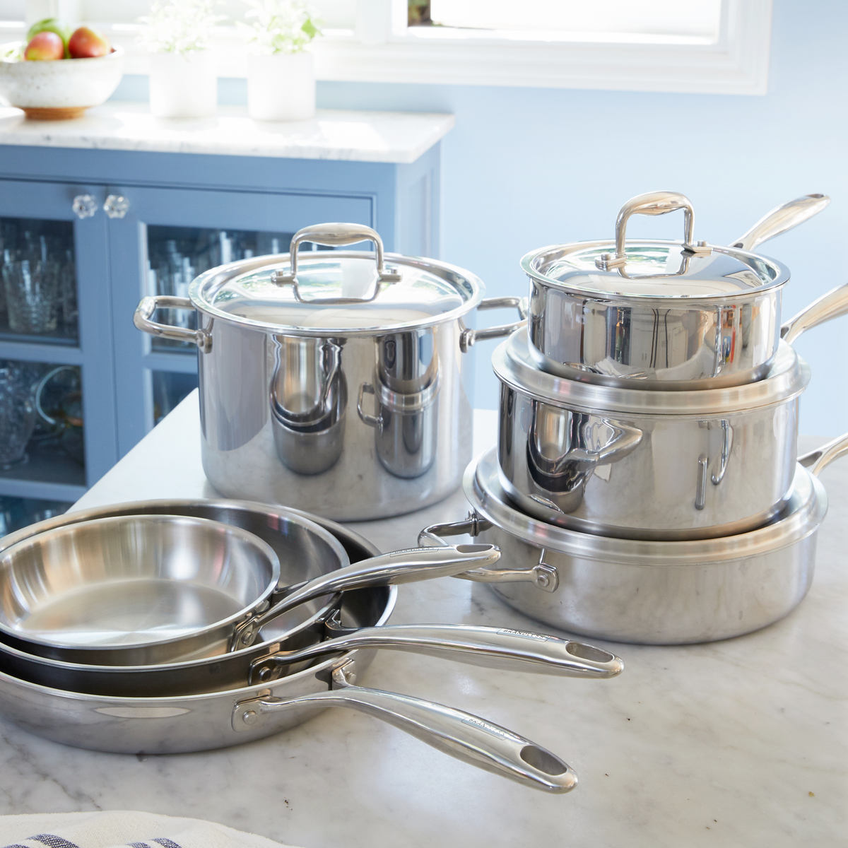 Product photo, 8, 10, and 12 inch fry pans, stock pot, saute pan, and the 2 quart and 4 quart sauce pans.